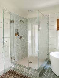 The shower area tiled with elegant gray tile looks really stylish and respectable. Blue Gray Shower Tiles Cottage Bathroom Lauren Liess Interiors