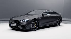 The Mercedes Amg Gt 4 Door Coupe Now Offered With Aero Kit Top Speed Mercedes Amg Black Mercedes Benz Mercedes Car