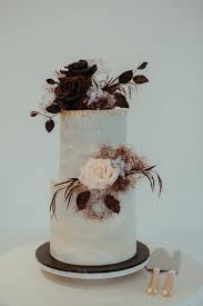 The Smoke Bush Elevates This Cake Arrangement To Something Amazing Floral Wedding Cakes Modern Wedding Cake Wedding Cakes
