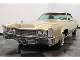 Image result for Medium Gold 1969 Cadillac