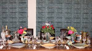 For a twist on traditional table runners, place a small sheet of clear polycarbonate over prints, ferns, and other natural ephermera. Seafood Dinner Party With Vintage Fish Dinner Service Chic Party Ideas