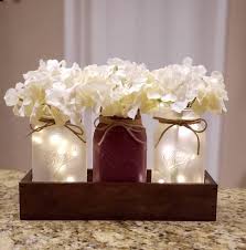 Mason Jar Centerpiece With Lights Farmhouse Table Decor Rustic Decor Farmhouse Centerpiece Lighted Mason Jars Table Centerpiece In 2020 Lighted Centerpieces Mason Jar Centerpieces Jar Centerpieces