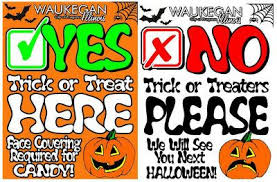 Claire made a welcome trick or treaters sign and will hang it on the door so that the trick or treaters can see it. News Flash Waukegan Il Civicengage