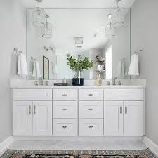 Open Spacious White Washroom With Double Vanities And Silver Accents Designstorms Washroom Decor Double Vanity Bathroom Bathrooms Remodel