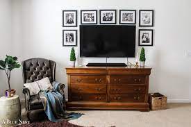 You can paint foliage, artwork, or quotes on the back of the wall to give it an artistic feel, without hanging anything additional. 25 Best Tv Wall Ideas How To Arrange A Wall With A Tv Apartment Therapy