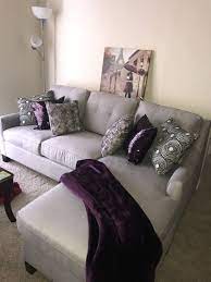 Platinum Microsuede Sofa Accented With Eggplant Throw Sequin Eggplant Pillows Living Room Decor Living Room Color Schemes Living Room Inspiration