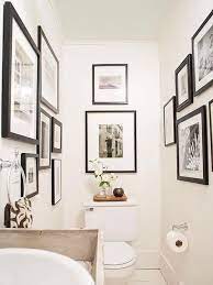 L Arte Di Appendere I Quadri Alle Pareti La Gatta Sul Tetto Piccolo Bagno Di Servizio Ispirazione Bagno Design Del Bagno