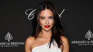 Her natural hair color is brown, blue eyes. Adriana Lima Shows How The Brazilian Bombshell Leg Reveal Is Done At Art Basel Miami Vogue