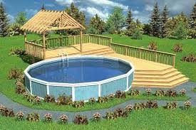 Given how much time you spend around your pool, it's worth a small investment of time and money to dress it up a little. Deck Around Above Ground Pool With Rope Railing Google Search Pool Deck Plans Pool Landscaping Backyard Pool