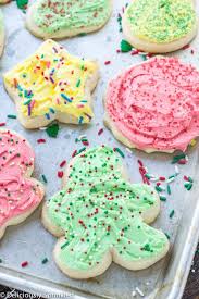 Deliciously Sprinkled The Best Sugar Cookie Frosting Deliciously Sprinkled In 2020 Christmas Cookie Frosting Christmas Cutout Cookies Best Sugar Cookies