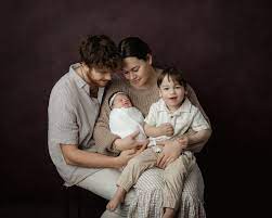 Q: Are parents and siblings included in a newborn session? A: YES —  absolutely! I love capturing the love and connection between families. I  know photos are often the last thing you