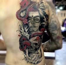 Tattoos for women tatoos temporary tattoos wrist tattoos small snake tattoo. Day Of The Dead Girl Tattoo Skulls Snake Women With Ink Tattoos Snake Tattoo Leg Tattoos