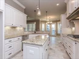 Spacious White Kitchen With Light Travertine Backsplash And Rectangular 12 X24 Floor Tiles Lane Crosno D White Kitchen Floor Kitchen Floor Tile White Kitchen