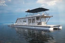 Bateau Maison Futuriste Un Projet Ecologique Qui Vous Fera Apprecier La Vie Sur L Eau Future Maison Maison Flottante Hangar A Bateaux