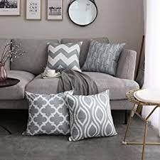Larger square throw pillows play well with smaller pillows in a similar shape, as well as longer, more rectangular decorative pillows. Amazon Com Grey Couch Pillows