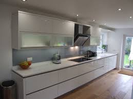 This album contains different styles of kitchens with white, grey & black glass splashbacks. A French Grey Glass Splashback Is A Great Addition To An All White Kitchen Glass Splashback French White Modern Kitchen White Kitchen Decor Modern Kitchen