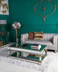 These tables come in a stylish chrome finish, while the table tops are mirrored. Alpha Champagne Mirrored Coffee Table Morale Home Furnishings
