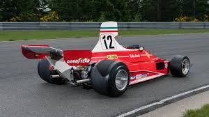 Yes, that is an 8 wheel f1 car. Watch Niki Lauda S Race Ready 500 Hp 1975 Ferrari 312t Formula 1 Car Tear Up The Track