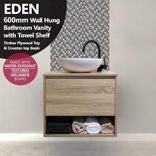 Price and stock could change after publish date, and a wooden, floating vanity makes this bathroom appear much larger by opening up the floor space. Eden 600mm White Oak Pvc Timber Wood Grain Wall Hung Vanity With Towel Shelf Timber Top Homegear Australia