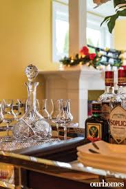 Holiday Spirits Are At The Ready For A Season Of Entertaining See More Of This Home In Season S Greetings Along The Seasons Greetings Seasons Winter Decor