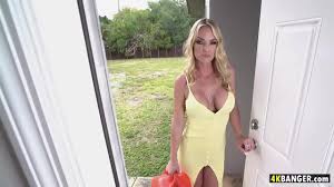 Sexy blonde MILF Alexis Fawx with her cleavage getting a facial