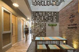 Bioclimatic boarding house keeps naturally cool in tropical Indonesia
