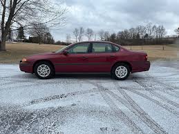 Image result for Sport Red 2005 Impala