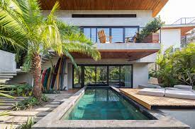 Covered with the white curtains, it provides complete privacy and bearer from direct sunlight. Nosara Maru House Loop Design Studio Archdaily