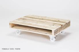 Coffee table on wheels is a piece of furniture that combines the properties of a tray and a small table. On Wheels Small Wood Coffee Table By Gas Air Studios Ltd Notonthehighstreet Com