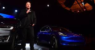 The long range and performance. New Tesla Model Y Unveiled With Longer Roll Out Timetable