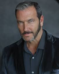 Good looking silver fox John Conroy