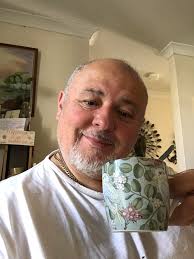 Celebrating my 58th birthday with iced coffee and cake