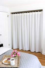 Replacing Bi Fold Closet Doors With Curtains Our Closet Makeover Bedroom Closet Doors Diy Closet Doors Closet Door Alternative