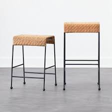 With its contemporary design and intricately woven rattan build, this bar stool is a great addition to your kitchen counter. Cesta Rounded Natural Woven Rattan Bar Stools