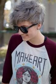 This dark brown tomboy haircut is bold and beautiful. Short Curly Pixie Hairstyles For Ladies Fashion Ze Short Hair Styles Curly Pixie Hairstyles Hair Styles