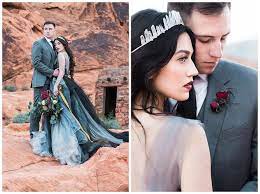 Black Wedding Dress And Dark Red Wedding Flowers With Crystal Bridal Crown At Valley Of Fire Desert Nea Blue Red Wedding Dark Red Wedding Black Wedding Flowers
