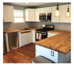 Maybe you would like to learn more about one of these? White Shaker Style Cabinets With Birch Butcher Block Counters Birch Kitchen Kitchen Countertops Countertops