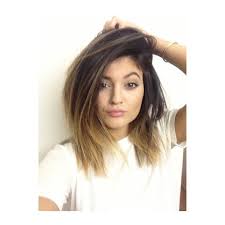Smooth locks and part in the center for a classy look. Kyliejenner A Broken Mirror
