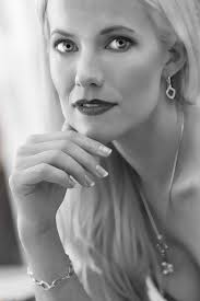 Curiously brilliant grey eyes hide beneath Cooper's astonishing long  lashes. So mesmerizing yet so innocent looking.