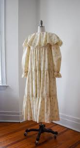 Character page for the enola holmes books and film. White Floral Plastron Dress Worn By Enola Holmes Millie Bobby Brown As Seen In Enola Holmes Spotern