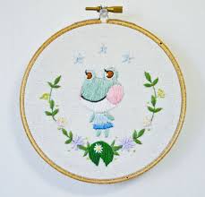 A small dress that has a similar design to animal crossing's stitches character. New Girl In Town Animal Crossing Embroidery Inspiration Embroidery Art