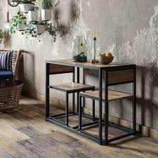 The look of a solid top table but with leaves that store underneath the table and can be pulled out, then inserted into. Stowaway Industrial 2 Seater Dining Set Furniture123