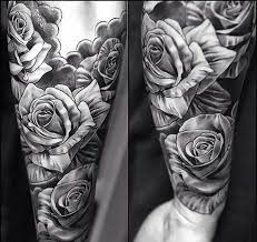 A Half Sleeve Tattoo With A Lot Of Roses Style Black And Gray Color Gray Rose Tattoos For Men Rose Tattoo Sleeve Black Rose Tattoos