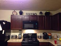 Pin By Tonne Herron On Kitchen Decor Above Kitchen Cabinets Kitchen Cabinet Design Cabinet Decor