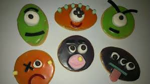 Monster Biscuits Milk Arrowroot Or Marie Biscuits Decorated With Coloured Icing And Lollies Pe Biscuit Decoration Halloween Cookies Decorated Kids Party Food