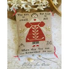Models stitched over two on 36 ct. Pineberry Lane The Gift Is Small E Pattern