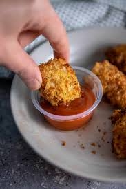 Ovens are hard for kids to use. Air Fryer Chicken Nuggets Garnished Plate