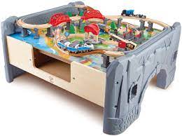 Funpeny train table toys,wooden train track railway city sets table for kids tod. Amazon Com Hape E3766 70 Piece Railway Train Table And Set Toy With Battery Powered Locomotive With Removable Playmat Surface And Storage For Kids 3 Years And Up Toys Games