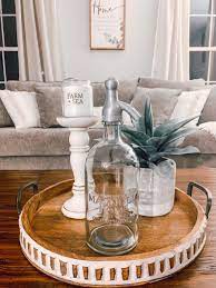 The table we used specifically, though, was rectangular, and some readers chimed in to request help with how to arrange a round coffee table. How To Decorate A Round Tray Round Dining Table Decor Coffee Table Decor Tray Dining Table Decor Centerpiece