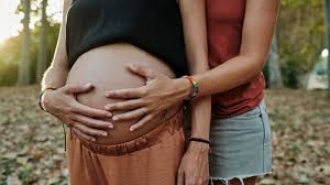 One mom carried & the other breastfed ...